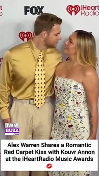 Alex Warren Shares a Romantic Red Carpet Kiss with Kouvr Annon at the iHeartRadio Music Awards