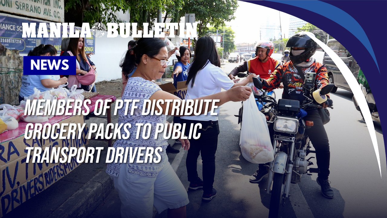 Members of Parents and Teachers Fellowship distribute grocery packs to public transport drivers