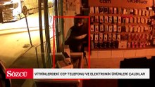 Kaldırım taşıyla kırdıkları vitrinlerdeki cep telefonu ve elektronik ürünleri çaldılar