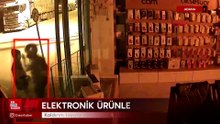 Adana'da kaldırım taşıyla kırdıkları vitrinlerdeki cep telefonu ve elektronik ürünleri çaldılar