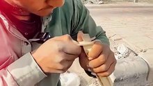 An Indian street Boy Making a Lather Web Belt technique in 2 minutes