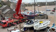 Tenby harbour boat lift signals seaside town's holiday season start