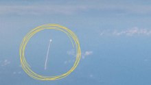 Un pasajero de un avión capta el lanzamiento de la misión Artemis 2
