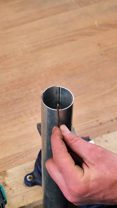 How to secure a bearing in a larger diameter pipe