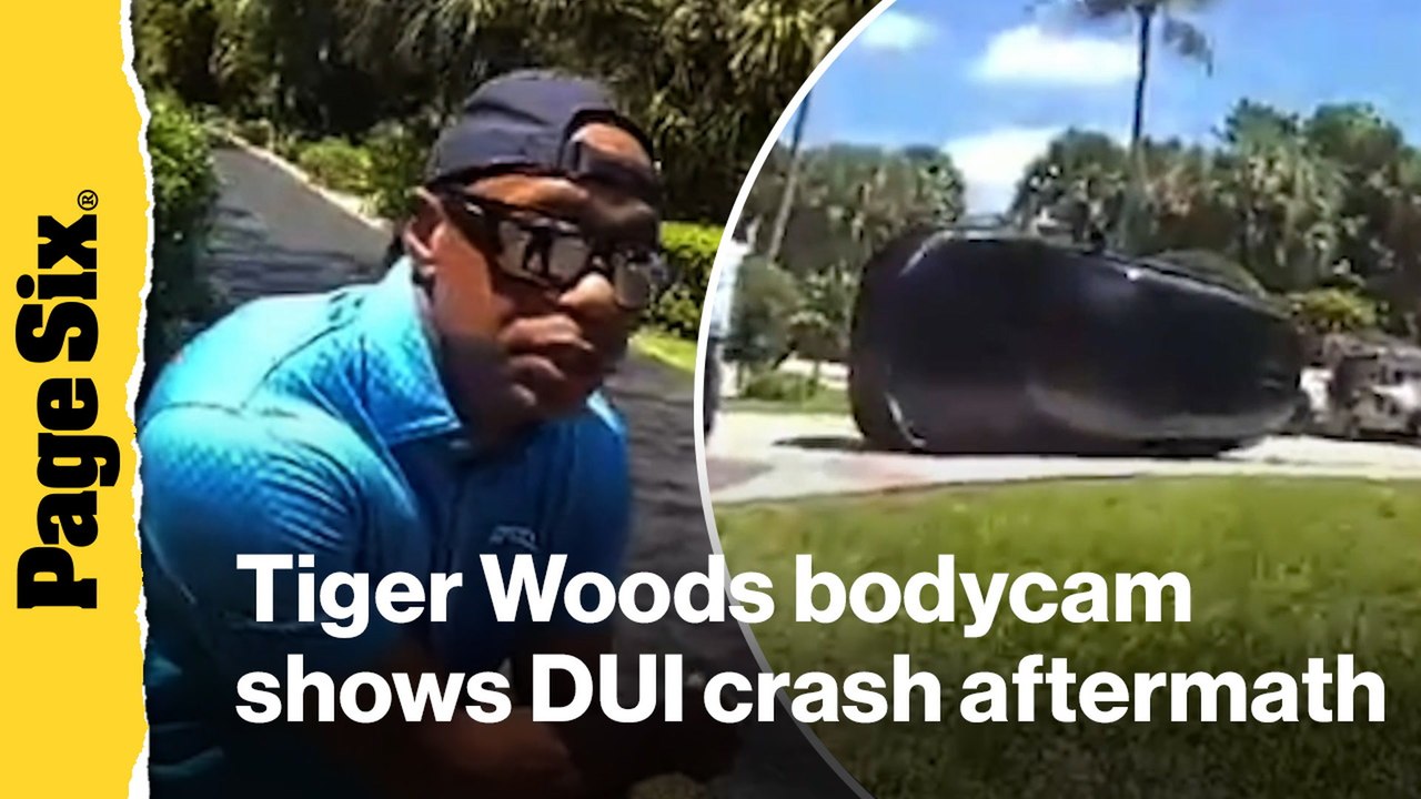 Newly-released Tiger Woods bodycam shows golfer crouching on side of road after DUI crash