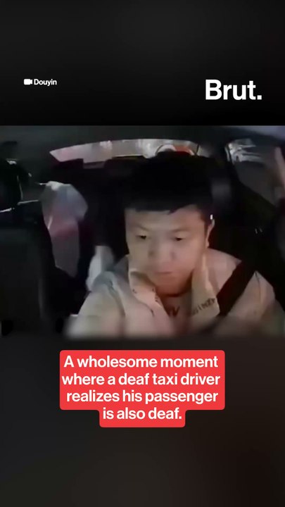 Moment where a deaf taxi driver realizes his passenger is also deaf.