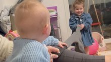 Toddler Begs to Pull Tights and Discovers Elastic Recoil