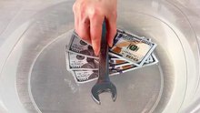 How many dollar bills does it take to hold a wrench 💵