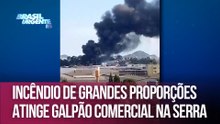 Incêndio de grandes proporções atinge galpão comercial na Serra