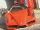 Exotic car collector shows Ferrari Enzo and Lamborghini revv