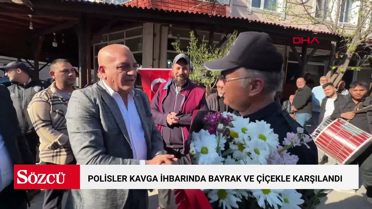 Kavga ihbarına giden polisler Türk bayrağı ve çiçeklerle karşılandı