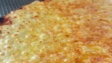 Triple cheese pizza fresh out of the oven!