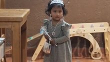 Little Girl Dressed as a Princess Stumbles and Regains Her Balance