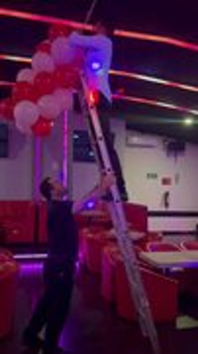 Man Falls From Ladder While Decorating Bar