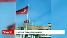 Rüzgarda dolanan bayrağı düzeltmek için 15 metrelik direğe tırmandı; o anlar görüntülendi