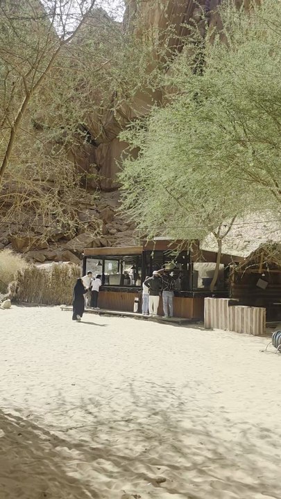 “Tourist Destination Shalal Cafe Al Ula with Scenic Paths and Rock Formations”