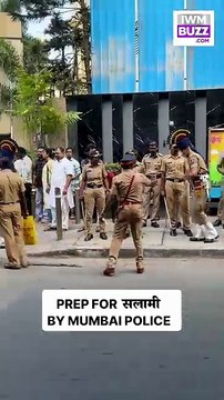 Police personnel prepare to offer a final salute to Asha Bhosle, reflecting a moment filled with honor and deep respect. A solemn farewell as the nation remembers a legendary voice and her lasting legacy.
