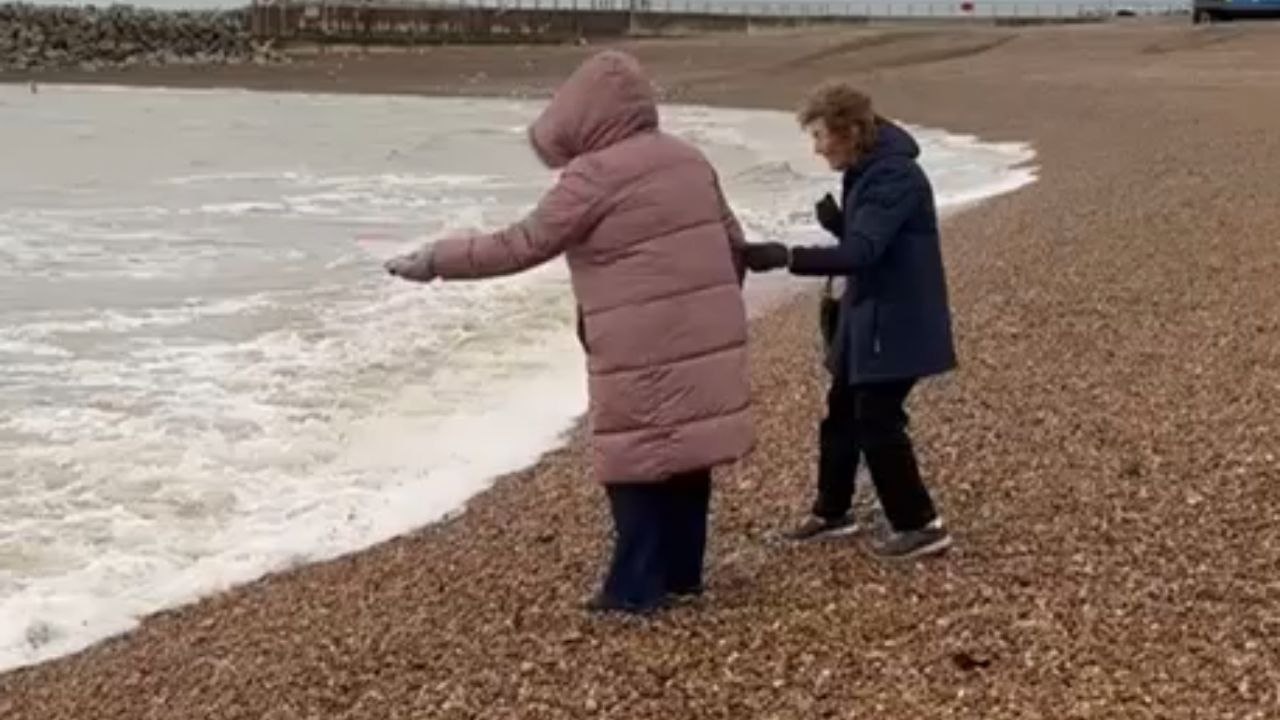 Ashes Are Dispersed After A Wave Displaces Two Individuals In Shallow Waters