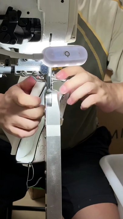 Watch a beautiful shoulder bag being crafted step by step using a sewing machine.