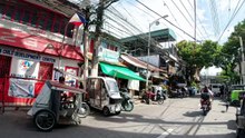 Rushed Morning on A. Rivera Street in Manila City in the Philippines