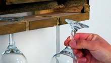 Converting a wooden pallet into a wine display rack