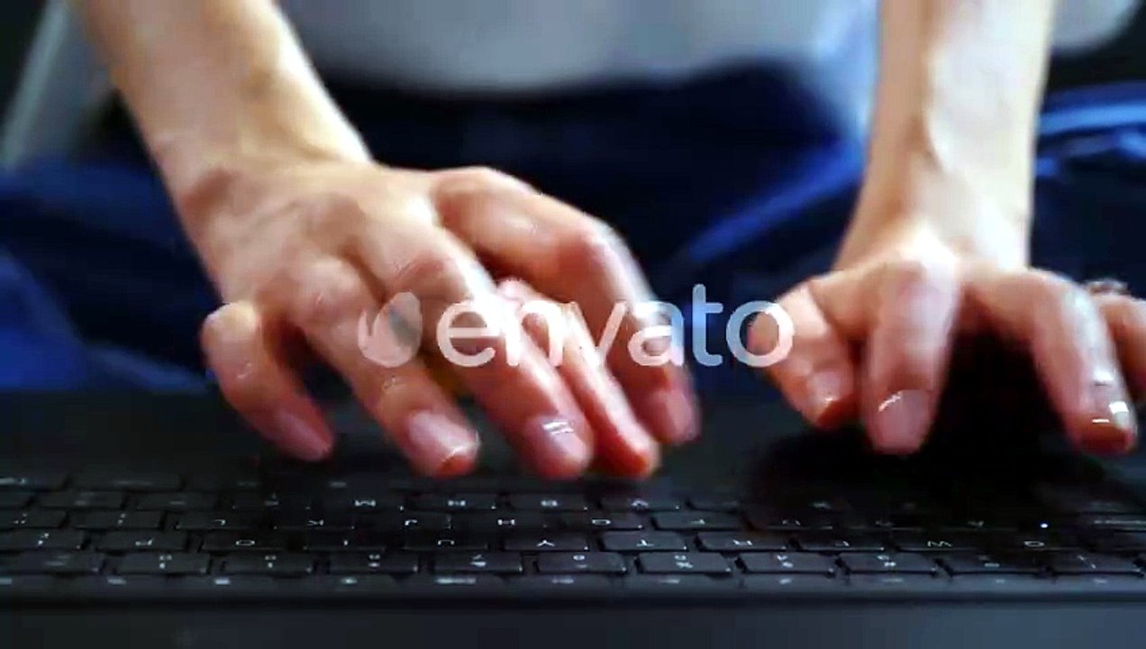Caucasian female hands texting on laptop keyboard close up.