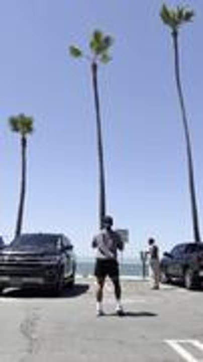 Man Gets Football Stuck on Palm Tree While Trying to Retrieve Stuck Drone