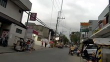 Bottleneck on Rizal Street in Los Banos, Laguna, Philippines