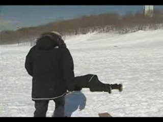 Reporter Gets Taken Out By A Sled