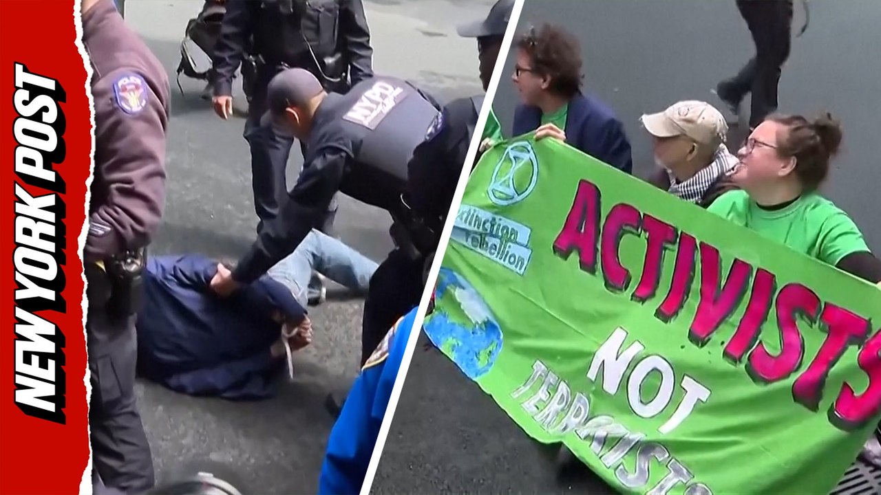 Climate protestors arrested outside Trump Tower