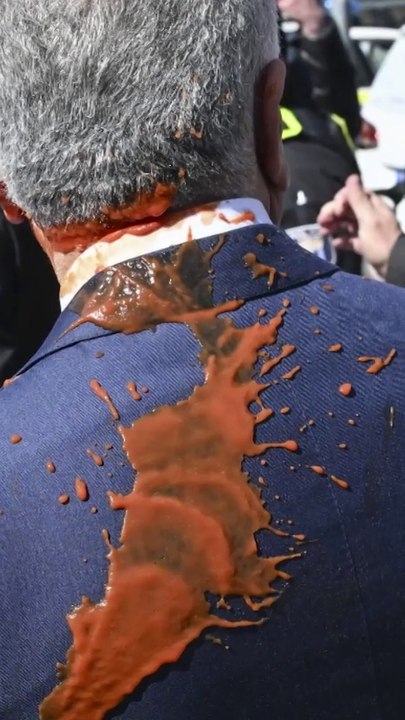 Son of Iran's ousted Shah doused with red liquid in Berlin