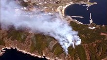 Wildfires spread towards town in northeastern Japan
