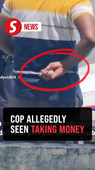 Ipoh police launch probe into viral video of cop allegedly taking money from man