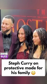 Steph Curry protecting his wife, Ayesha Curry, and their daughter, Riley Curry, from the crowd at The Lost Boys opening night on Broadway