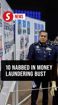 Cops smash money laundering op in Ampang, 10 foreigners nabbed