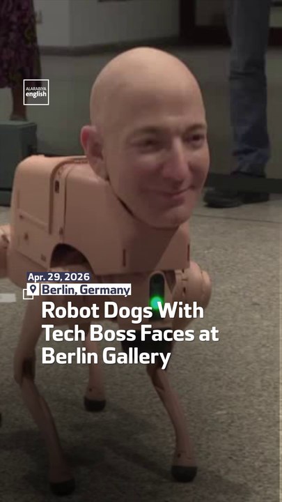 Robot Dogs With Tech Boss Faces at Berlin Gallery
