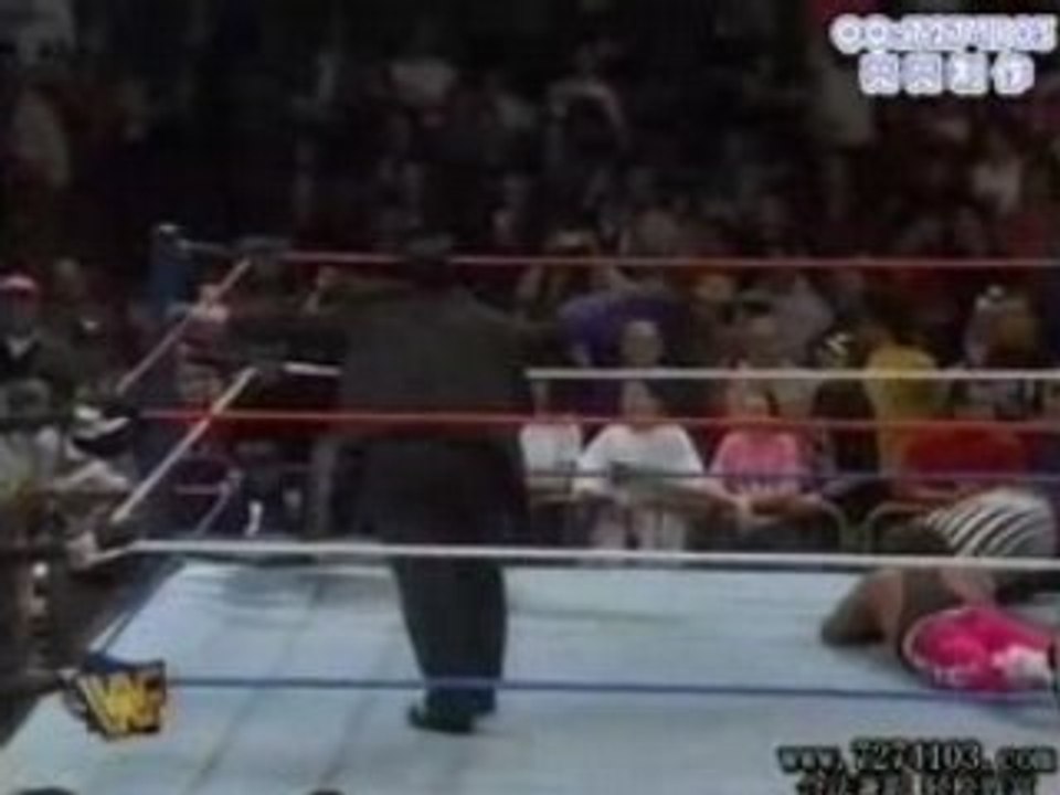Diesel (Kevin Nash) flips up the bird to The undertaker