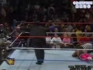 Diesel (Kevin Nash) flips up the bird to The undertaker