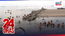 Dumi sa Baseco Beach, ‘di iniinda ng ilang naligo roon para maibsan ang init | 24 Oras