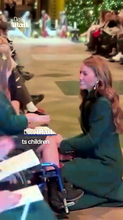 Attentive Princess Kate delights children at her Christmas Carol Concert as she spends time chatting with them all before service begins
