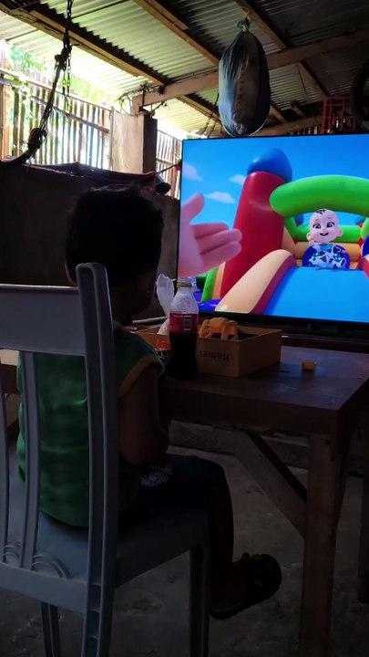 Isaiah watching TV