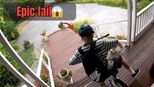 Young Boy Crashes Bike While Riding Down Stairs