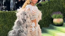 Queen Bey Shines in a Stunning Feathered Gown
