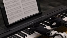 Take a look at these hands: Genesis AI says it taught a robot to cook and play piano close to human-level performance
