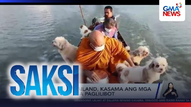Monghe sa Thailand, kasama ang mga alagang aso sa paglilibot para mamigay ng limos | Saksi
