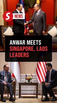 Anwar holds bilateral talks with S'pore, Laos counterparts