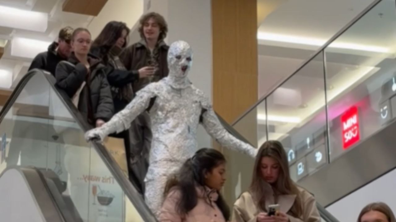 Shiny DIY Costume Draws Eyes In A Busy Public Space