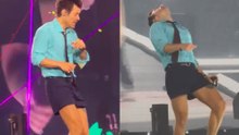 Harry Styles scares fans after choking on water during Wembley Stadium concert