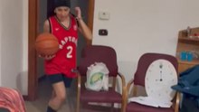 'Shattered Hoops' - Girl's unintentional slam dunk leads to ceiling lamp catastrophe