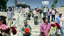 Активисты за мир проводят акцию в защиту палестинцев во время марша флагов в Иерусалиме